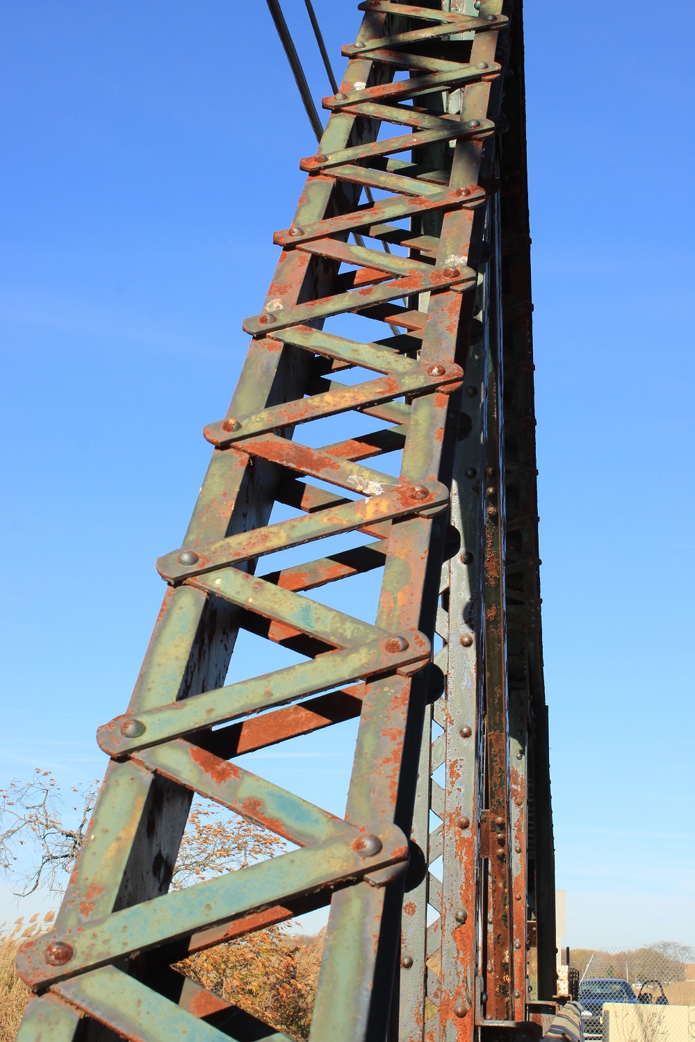 Iron Truss Support Beams along the side of the bridge that is longer in use and hasn't been for decades