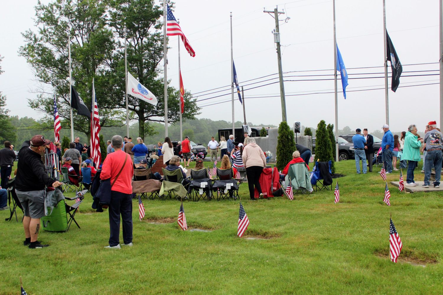 Group gathers around the main memorial at Salem County Veterans Cemetery to begin services on memorial day