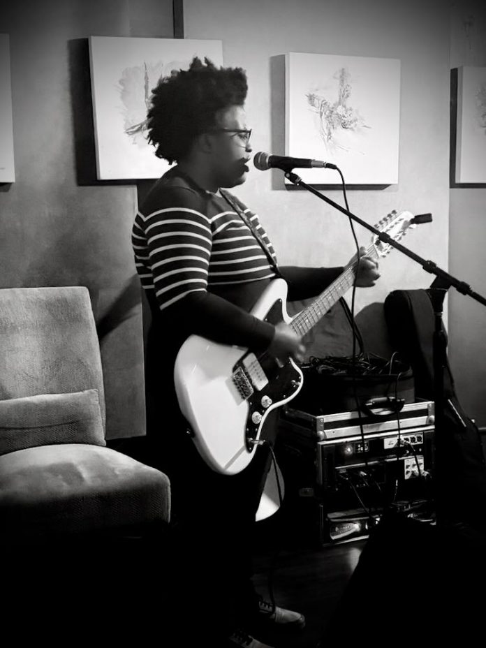 Mel Lynn playing at the Auburn Road Vineyard & Winery open mic recently