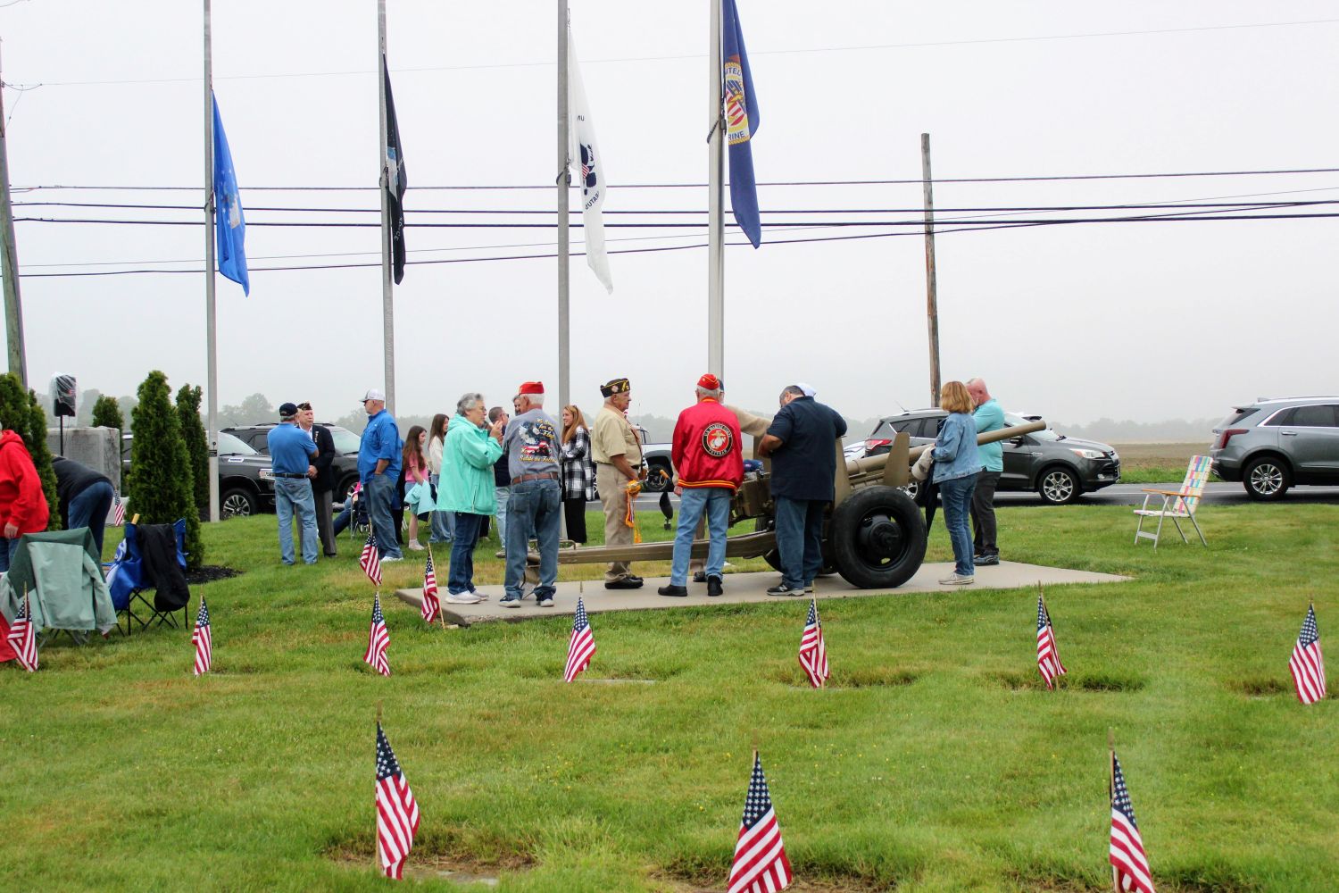 Vets and Community members gather around the newly restored cannons at Veterans Cemetery on Memorial Day 2026