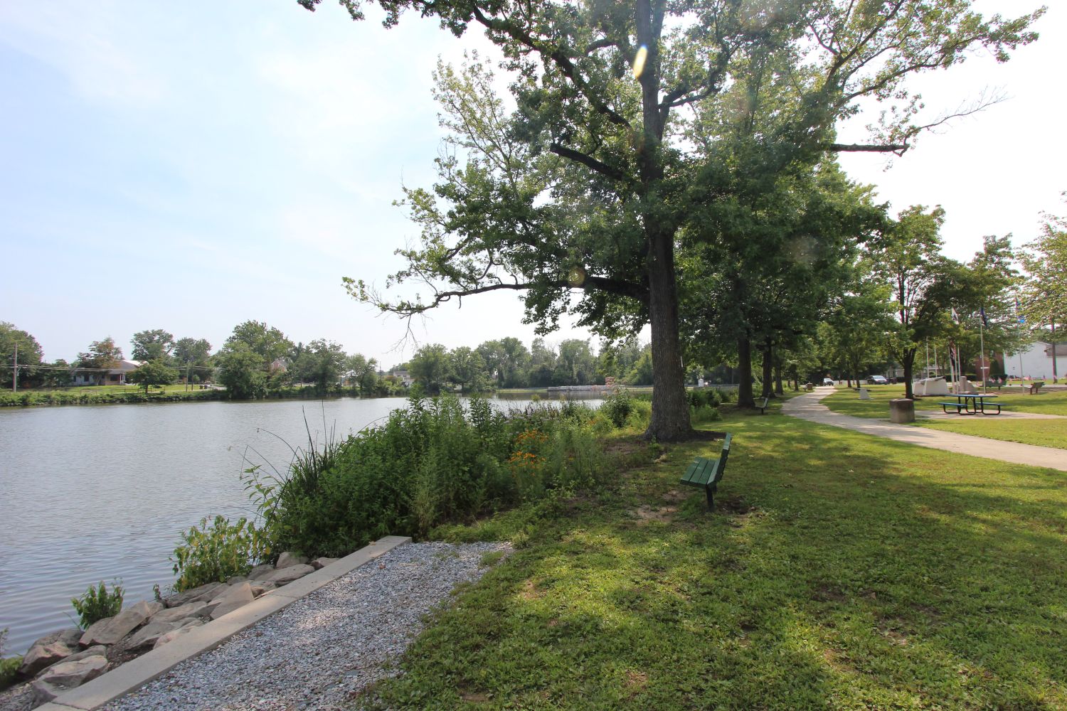 The banks along Veteran Memorial Lake with a fishing area in view