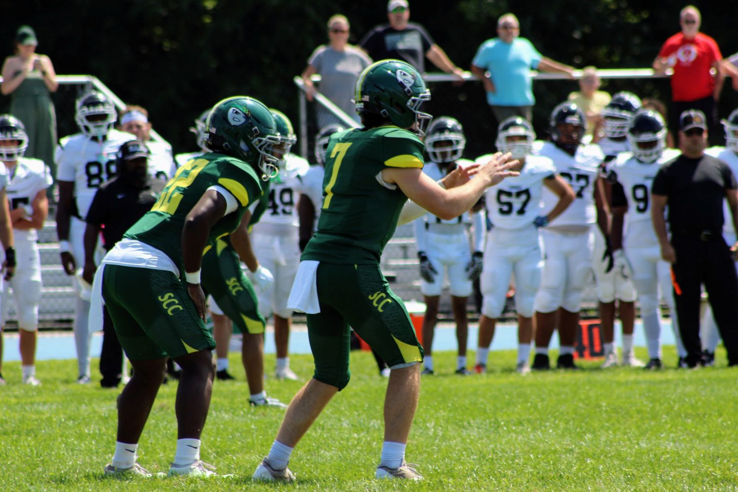 SCC Quarterback prepares to run a play