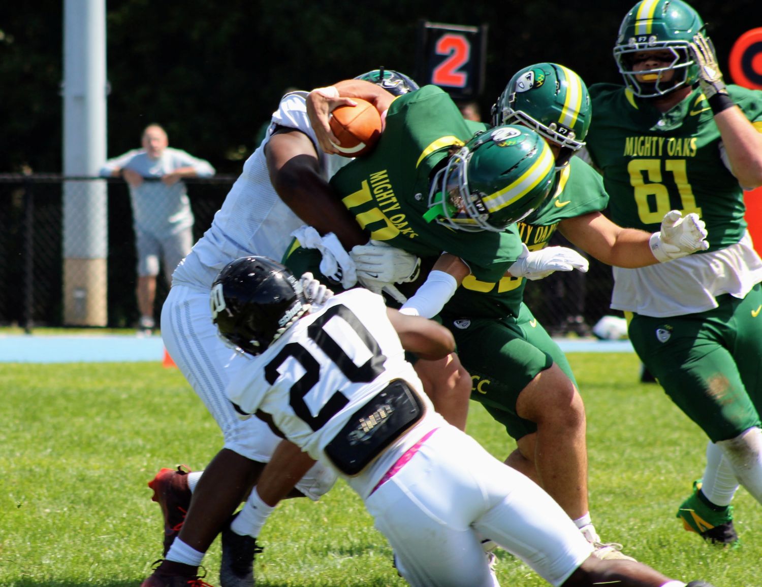 The Hudson Valley defense made life difficult for Salem CC quarterback Malakhai McKenzie (10). He was sacked for a safety above. (Photo by Zachary Ahl)
