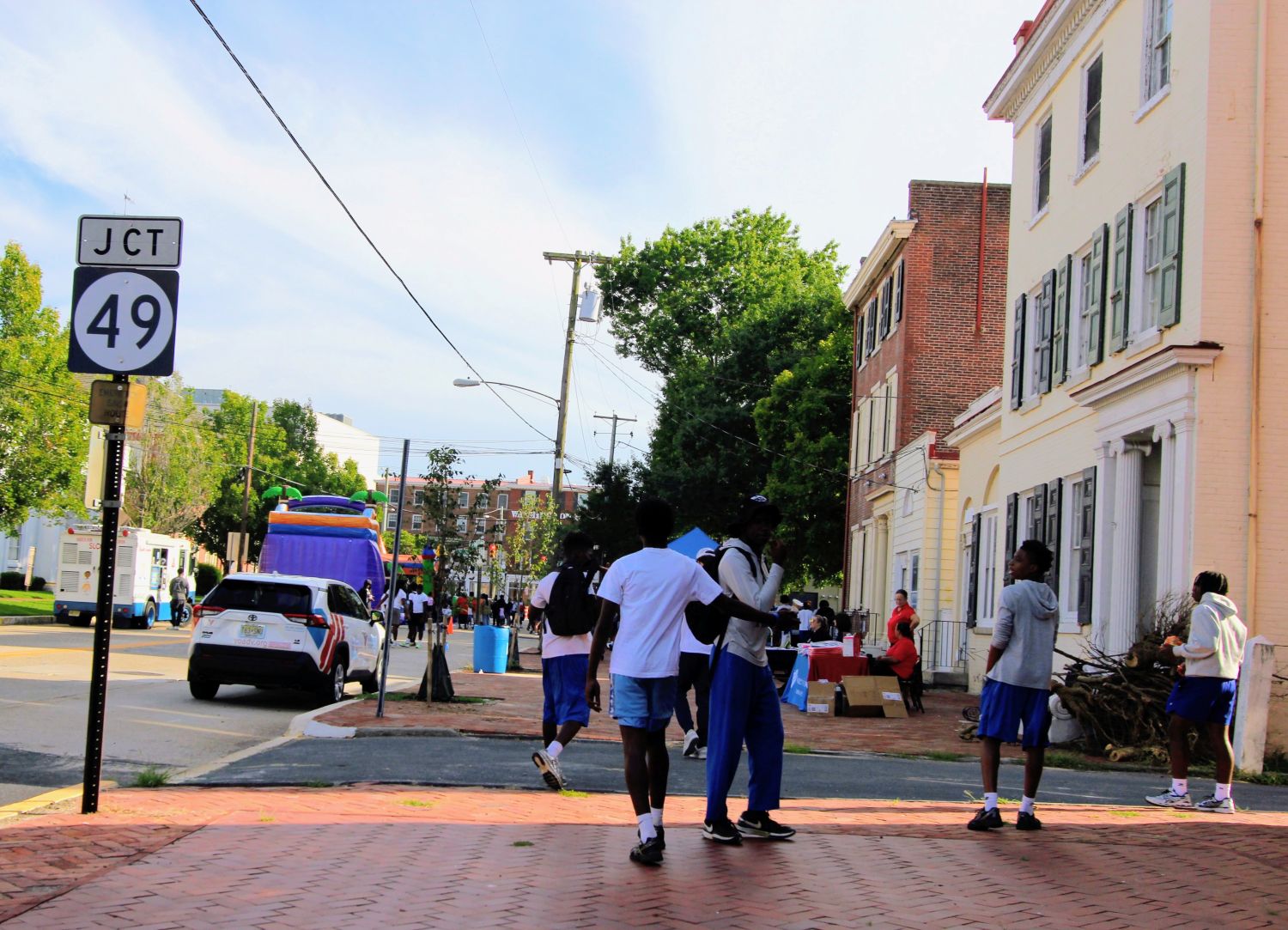 Young boys playing as walking up to the festivities