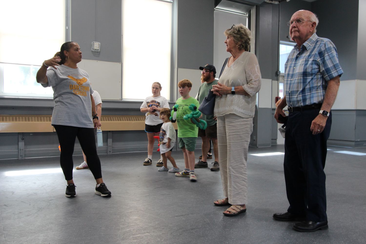 Tour group in the gym of Daretown School