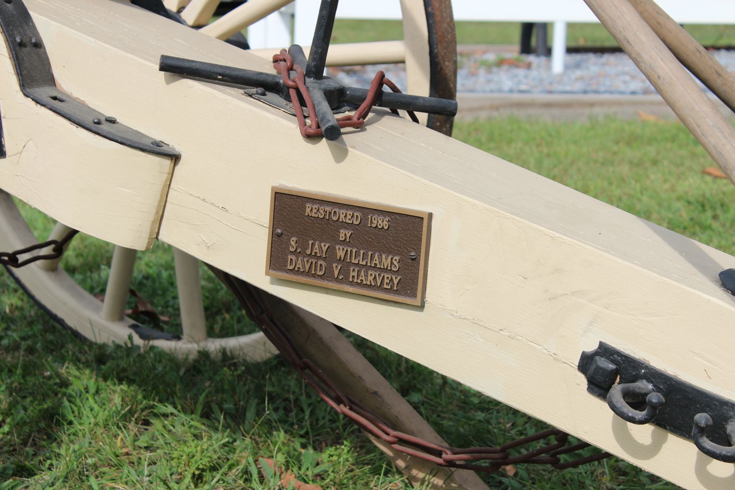 Tag on the cannon's carriage honoring Jay Williams and Dave Harvey who spent countless hours restoring and preserving the cannon