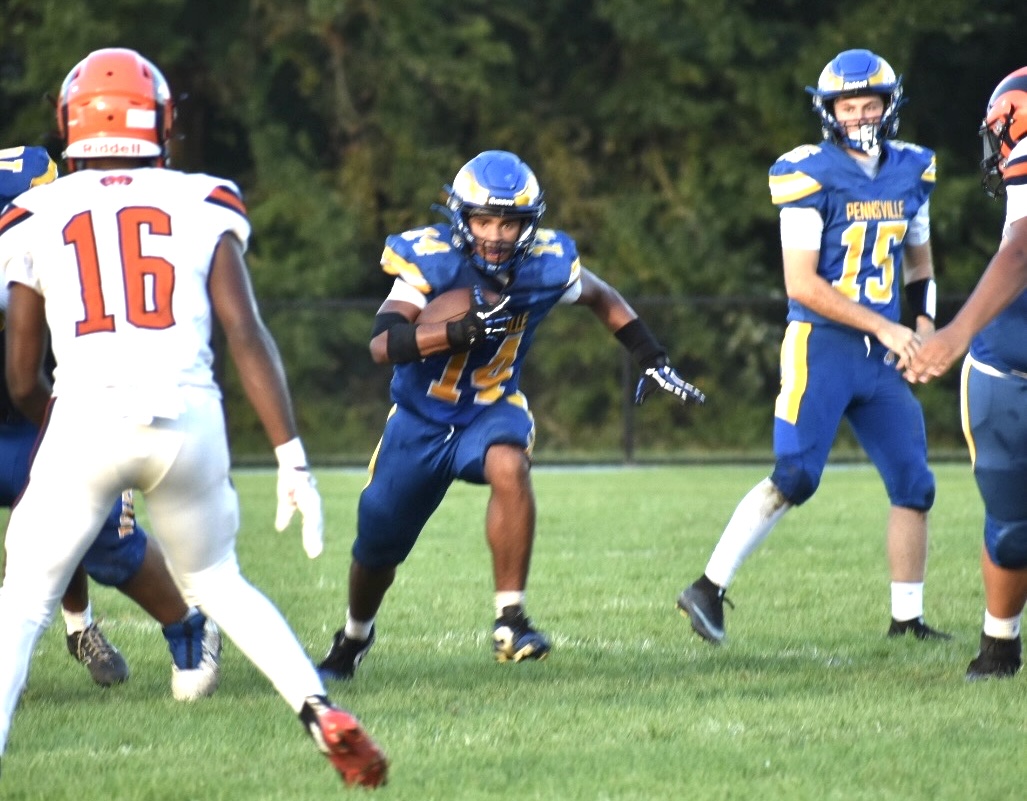 Pennsville’s Tristan Horner hits the hole and looks for running room.