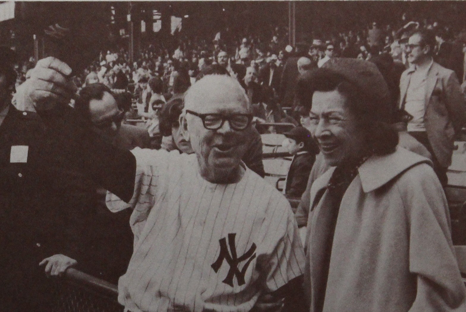 April 15, 1973: Mrs. Babe Ruth holds Whitey Witt's arm as he waves to the crowd during 50th-anniversary ceremonies at Yankee Stadium. (Alloway Remembers)