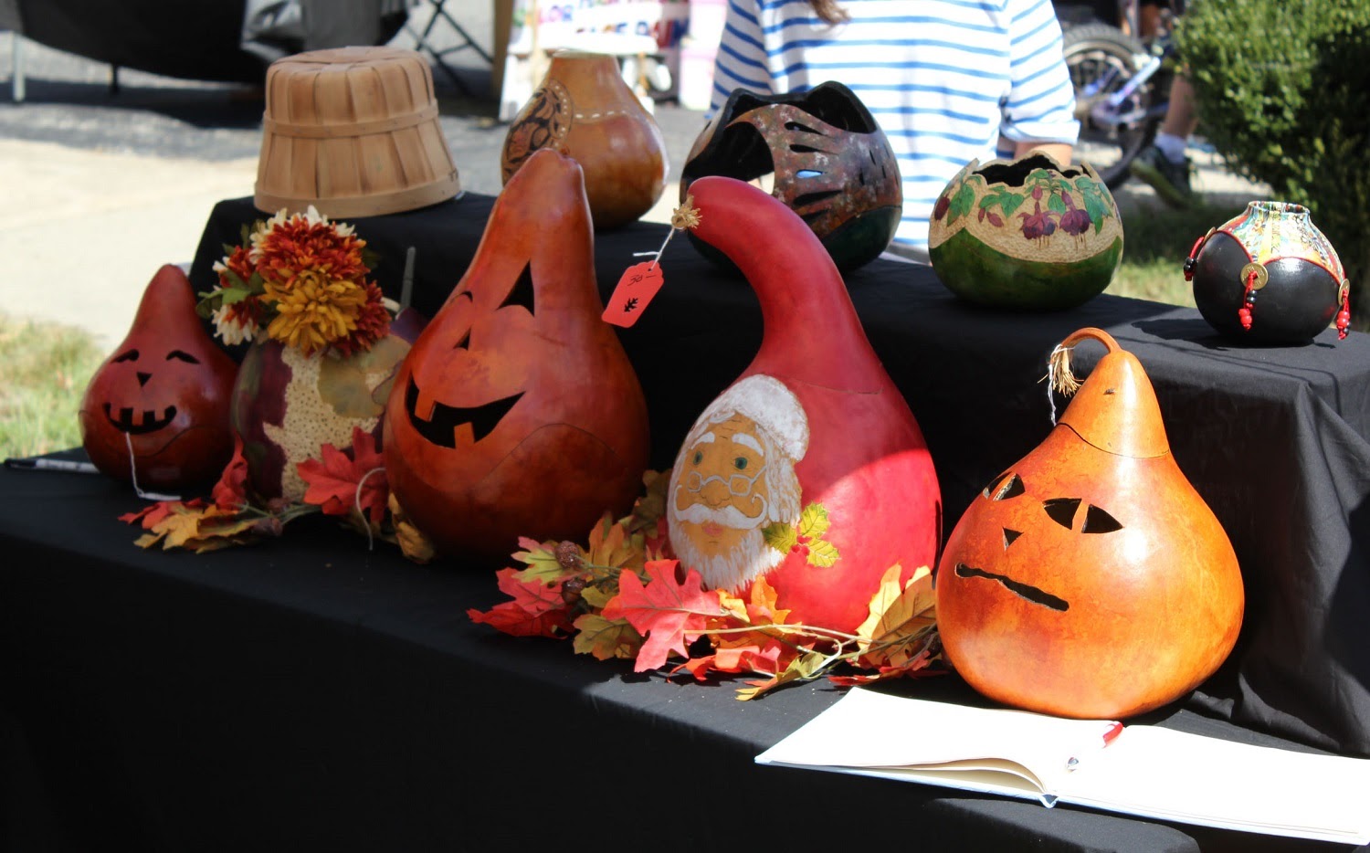 Gords and pumpkins on display at a past Fall Festival