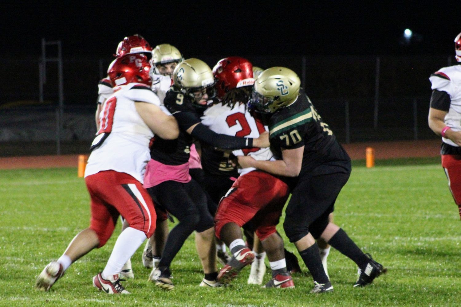 #70 Aiden Torres and 9 Gary Simonini with the stop