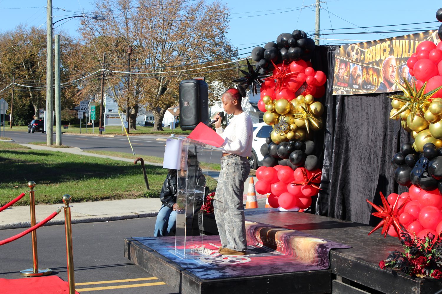 PGHS Drama Club member Ebony Dunn reading a letter from Willis's mother