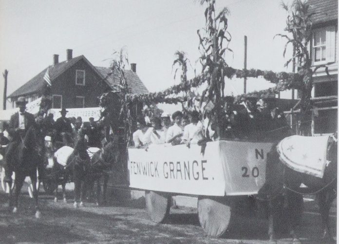 Horse-drawn parade float decorated with whole cornstalks, banner reading Fenwick Grange No. 20, Salem New Jersey, 1909