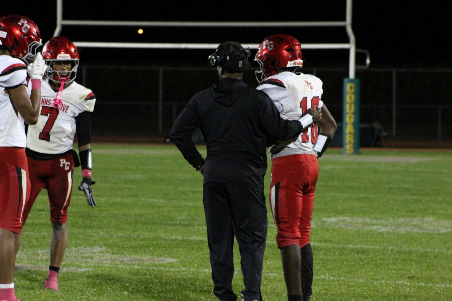 Coach Ware speaking to his players late in the game
