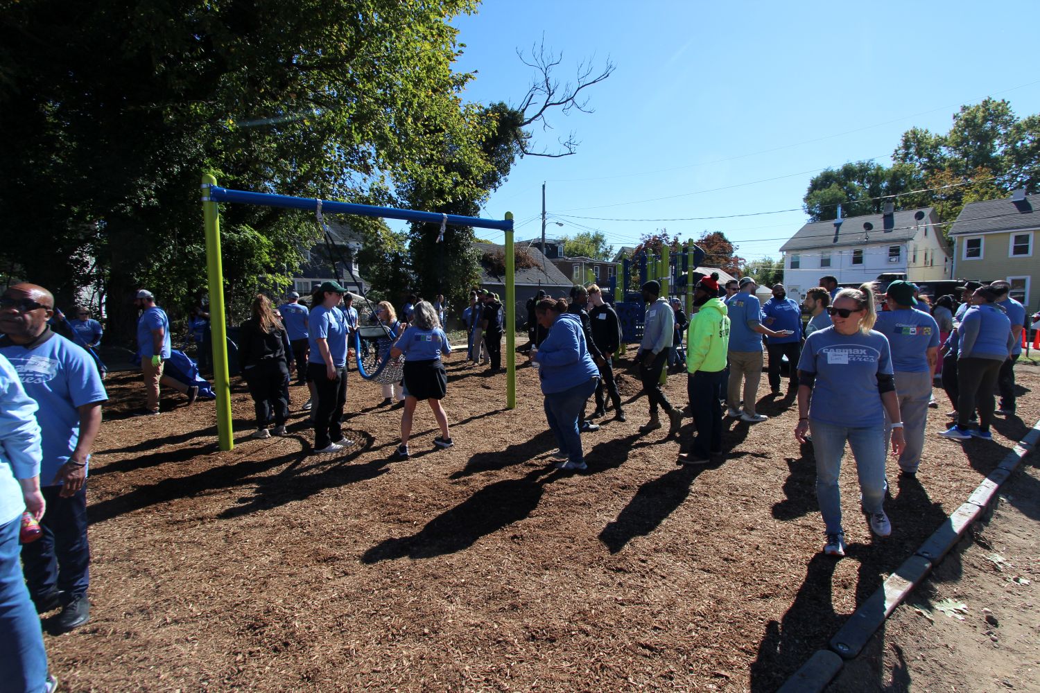Dance party on the playground to compact the mulch