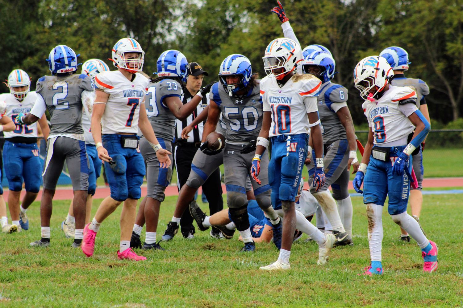 No 50 Tony Merendino celebrates his fumble.