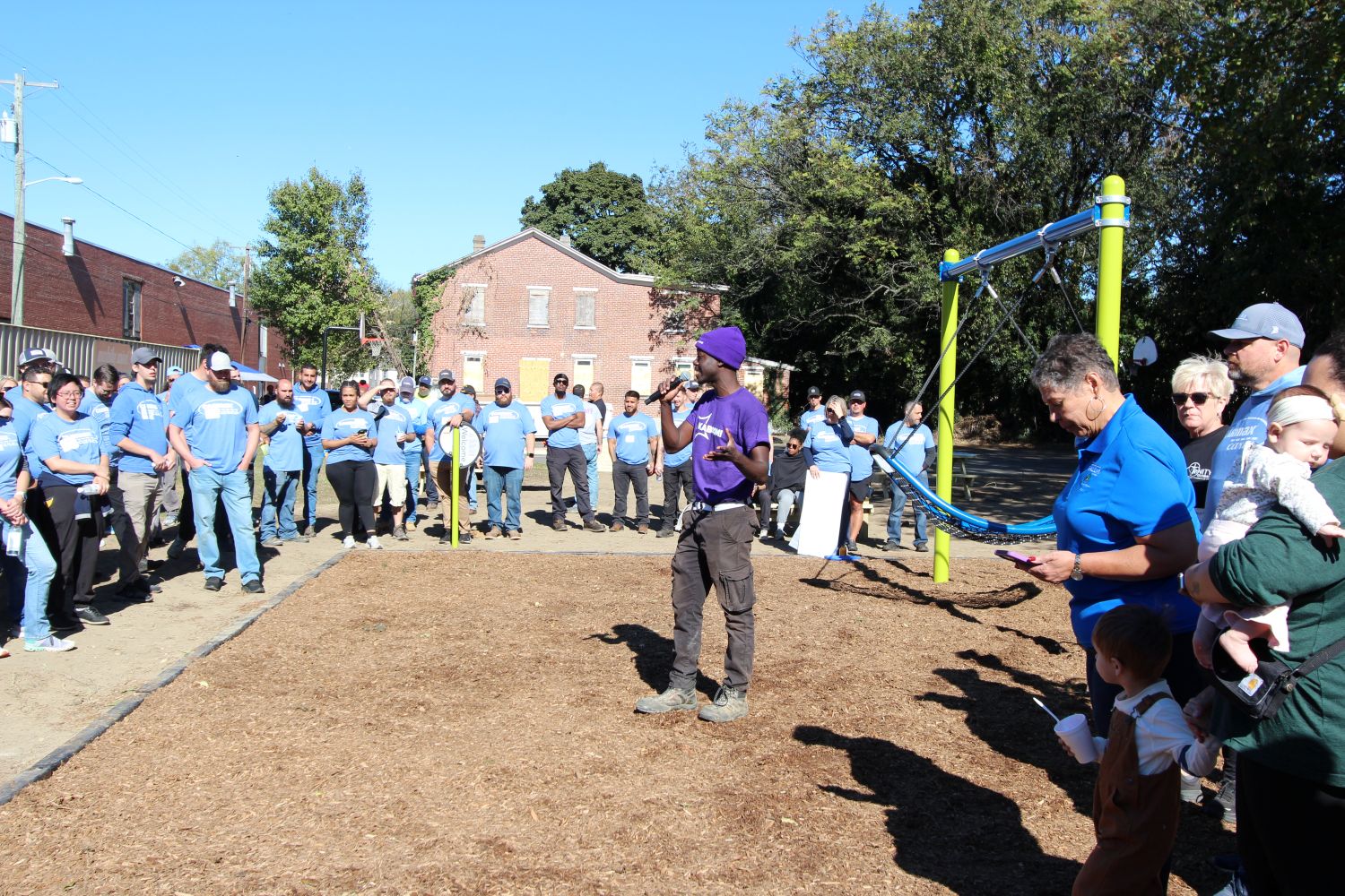 KABOOM! member speaking before the ribbon cutting ceremony