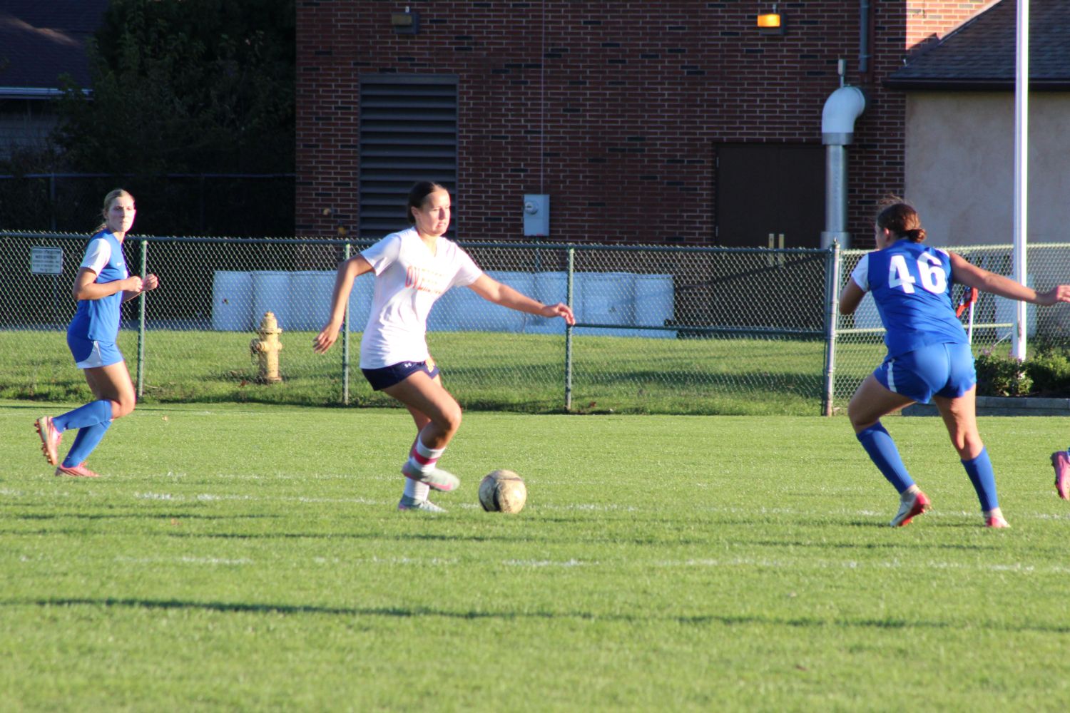 Overbrook No. 8 Anna Mason tries passing 46 Bella Lucas