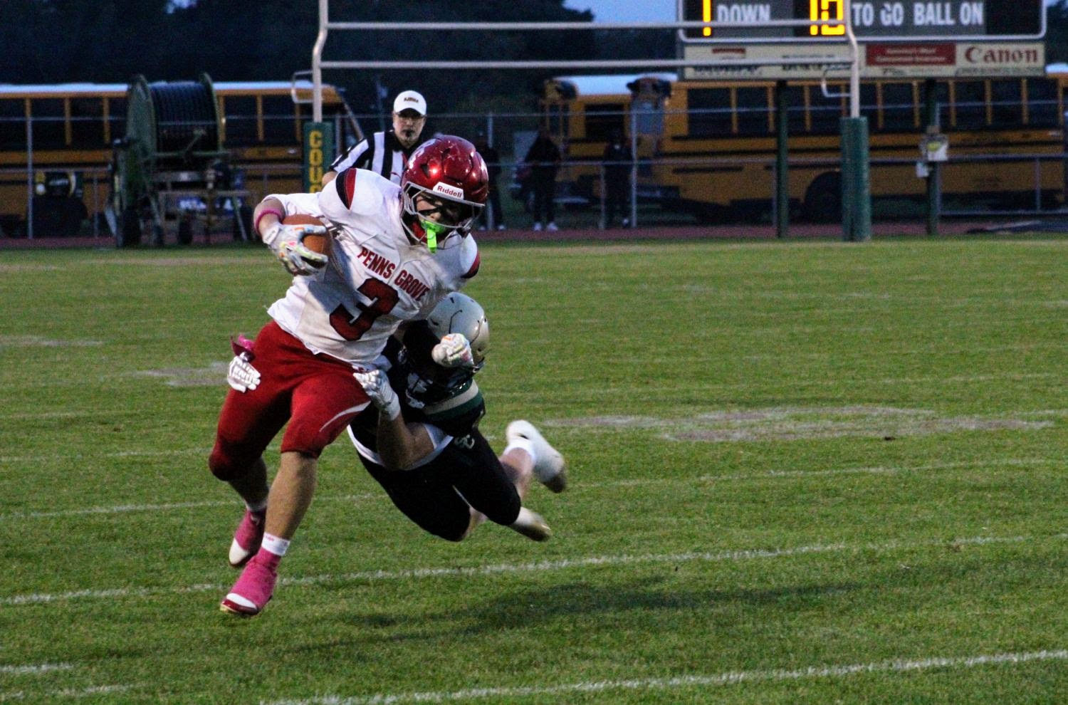 Penns Grove #3 Jerry Wooton fights off a tackle