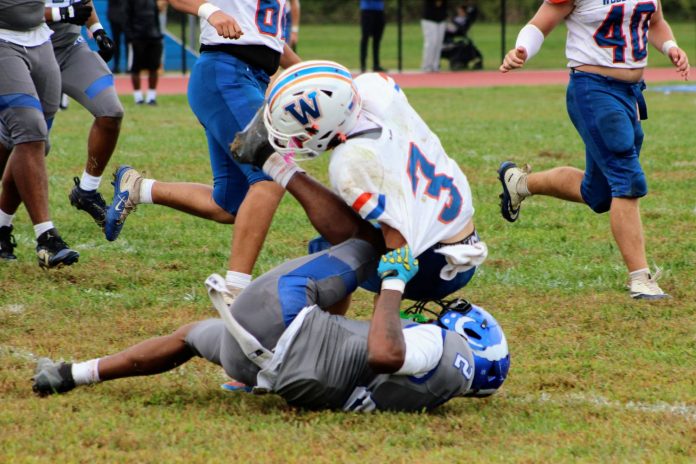 No . 2 Kamal Chatum brings down Woodstown's No. 3 Nathon Middlemiss