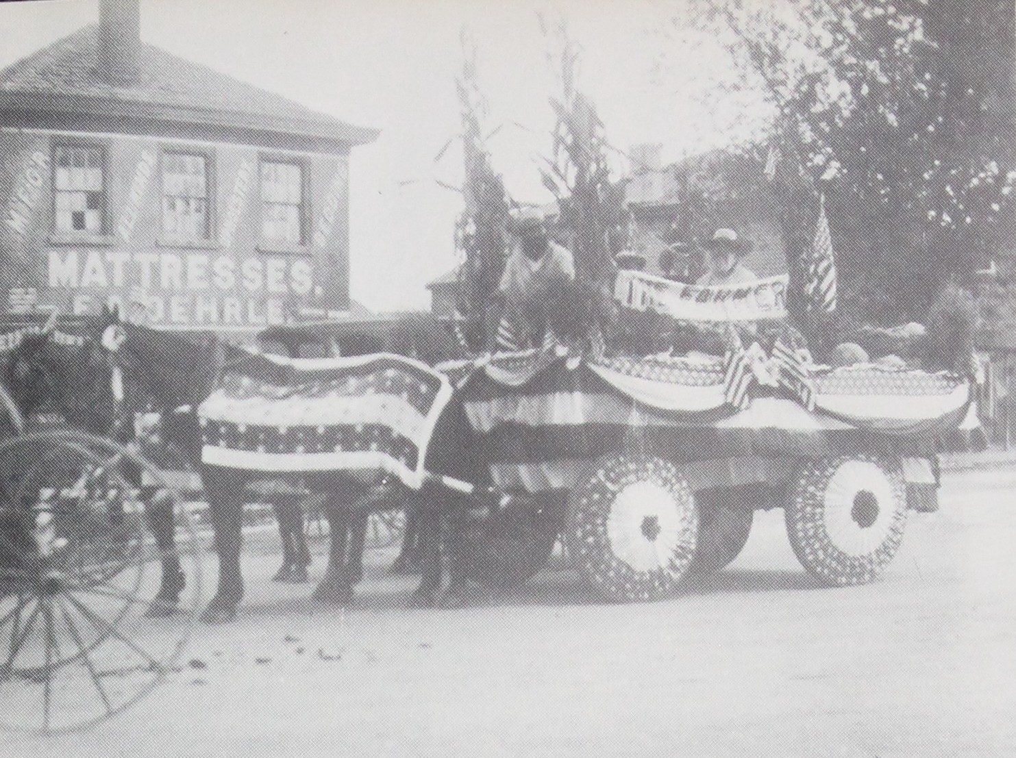 F. H. Lloyd's Float." A two-horse wagon heaped with produce, a squash the size of a washtub riding at the center of it, the bed trimmed in scalloped ruffle work and the name lettered on a banner above. (How Dear to My Heart, p. 30)