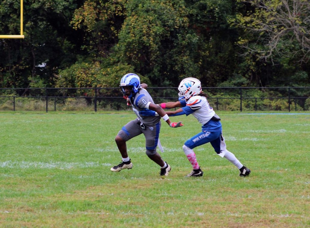 Salem No. 10 catches a pass in the first quarter and breaks a tackle