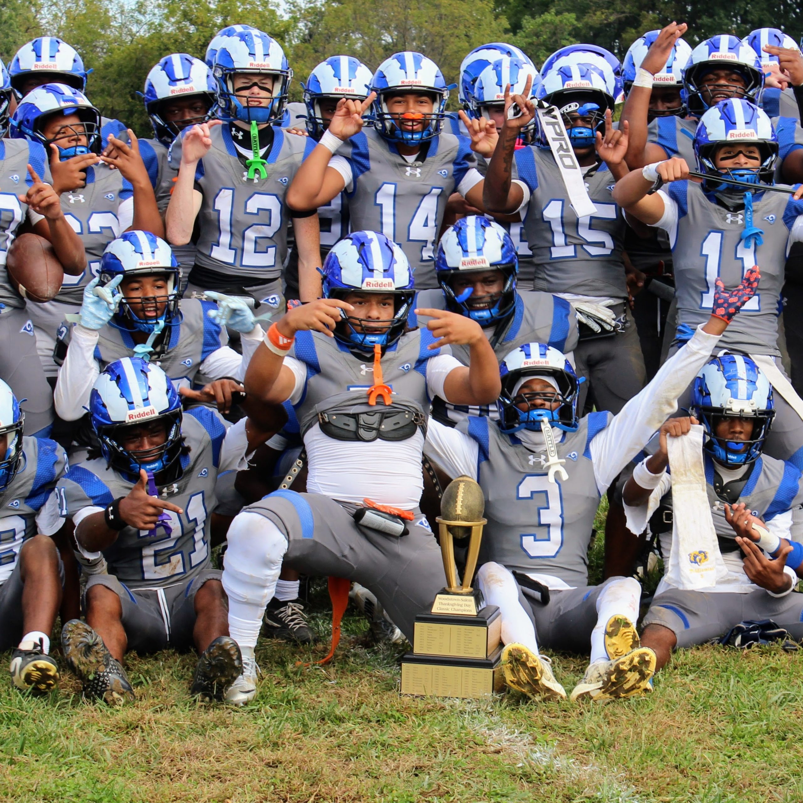 Salem celebrates with the rivalry trophy