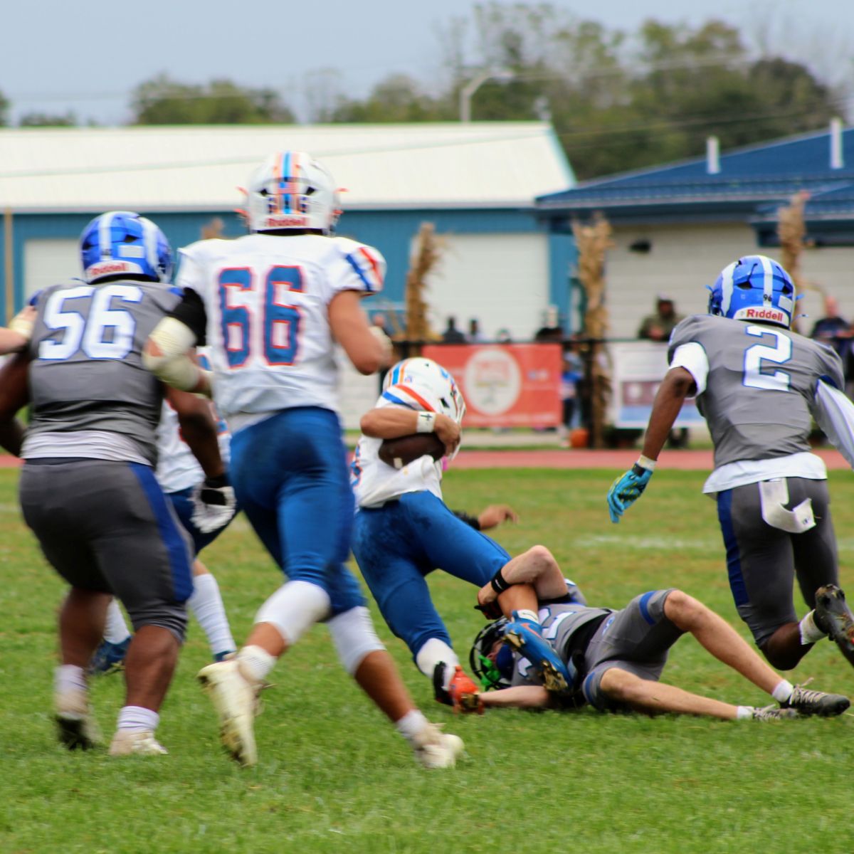 Salem's No. 12 Kane Green with a tackle in the first quarter on No. 3 Middlemiss