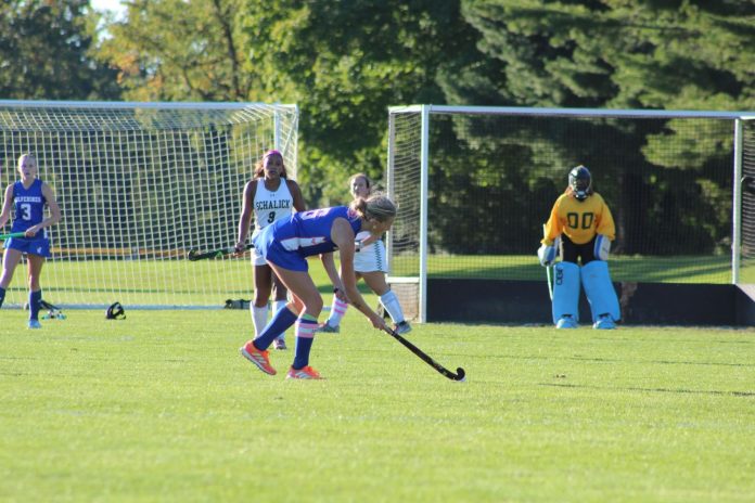 Woodstown No. 6 Shyann Higinbotham goes to take penalty hit