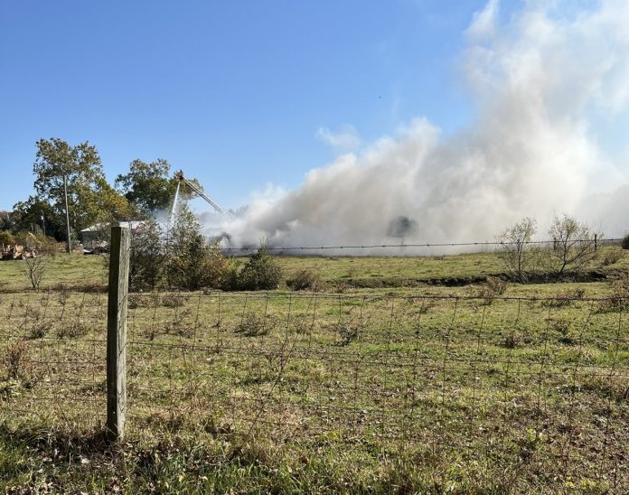 Smoke from the fire could be seen across the fields.